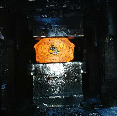 The temperature is depending on the forging blank (steel, iron, alloys) and process between 950 &deg;C and 1250 &deg;C.